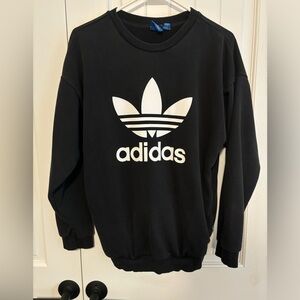 Small black Adidas sweatshirt.